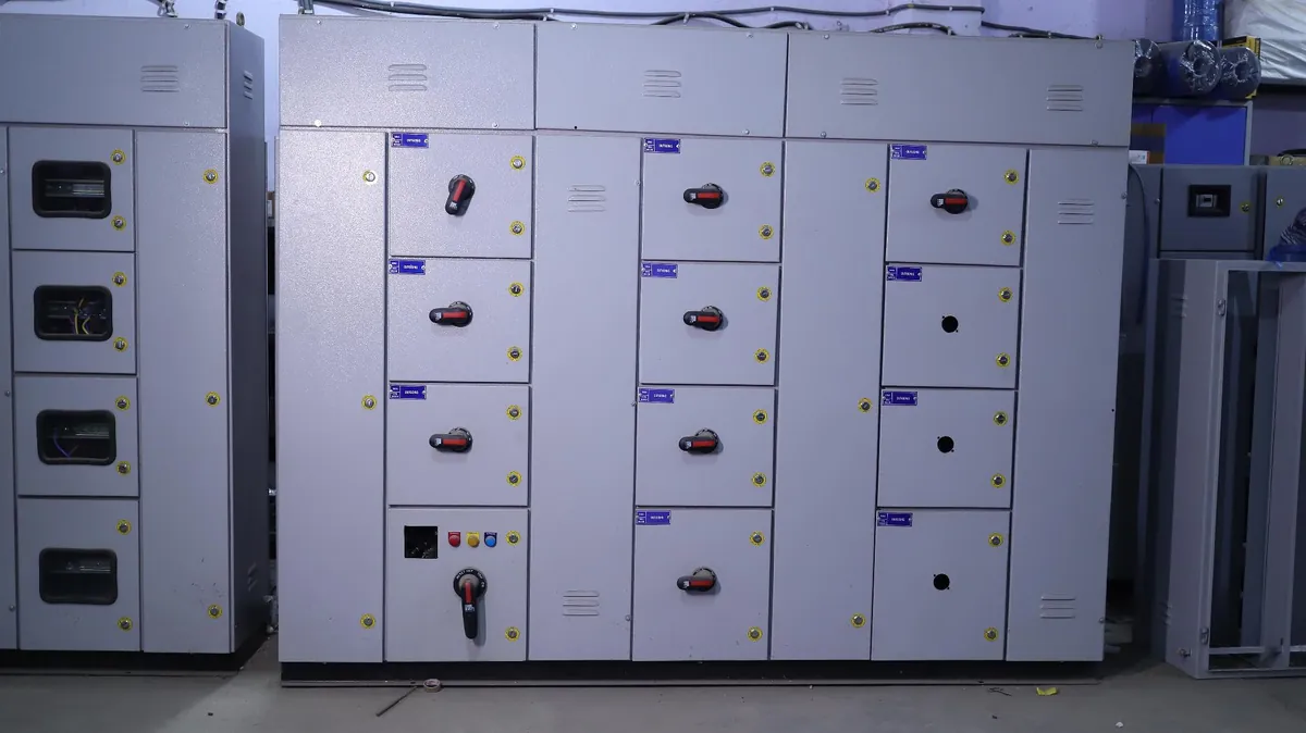 Multi-section main LT panel with MCCB feeders at the Amit Power Control factory
